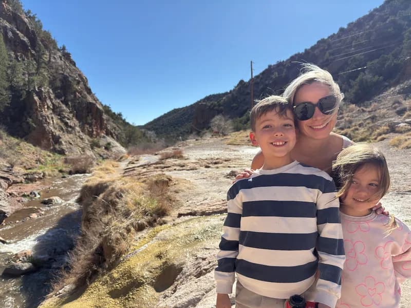 Mom and the kids on a creekside canyon hike in New Mexico
